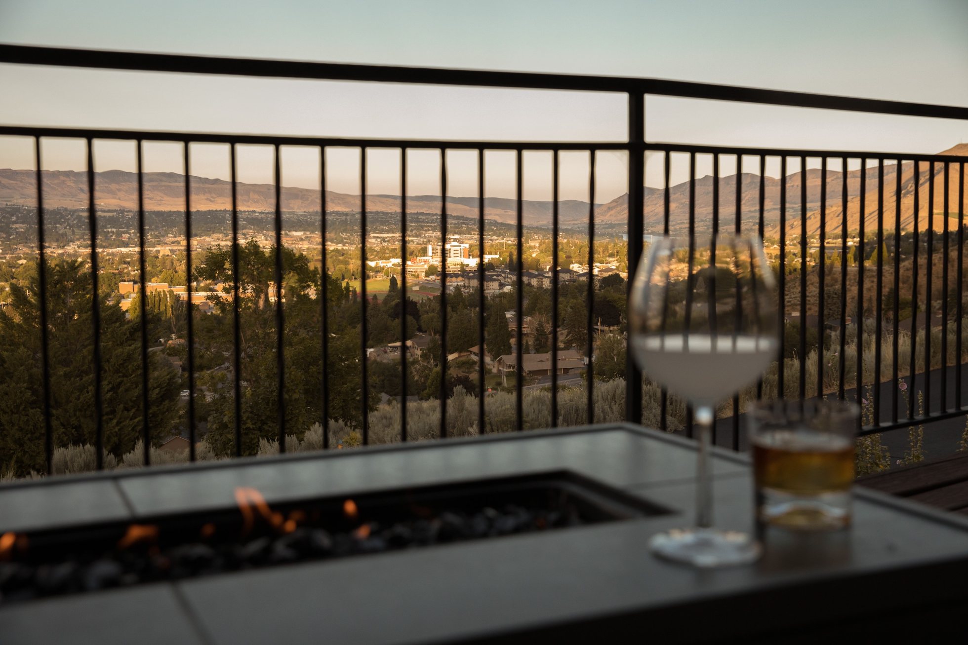 Fire table on deck against the valley backdrop